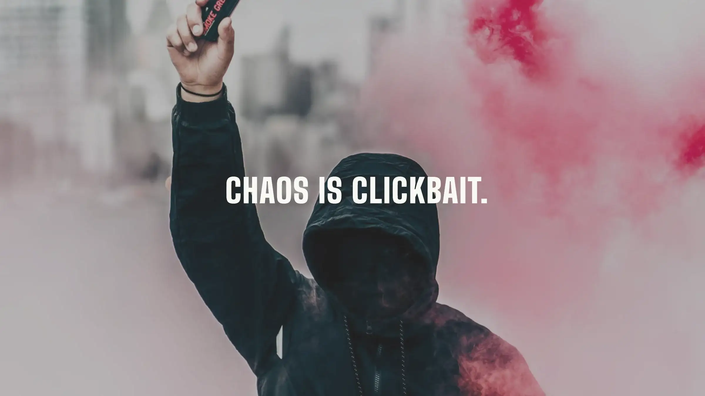 Slide: Chaos is clickbait, over a protester holding a flare in pink smoke
