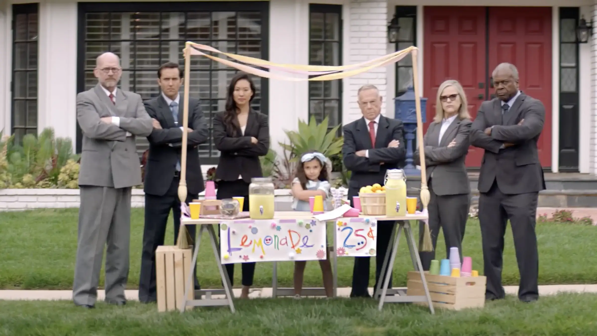Country Time's lawyers standing behind a kid's lemonade stand