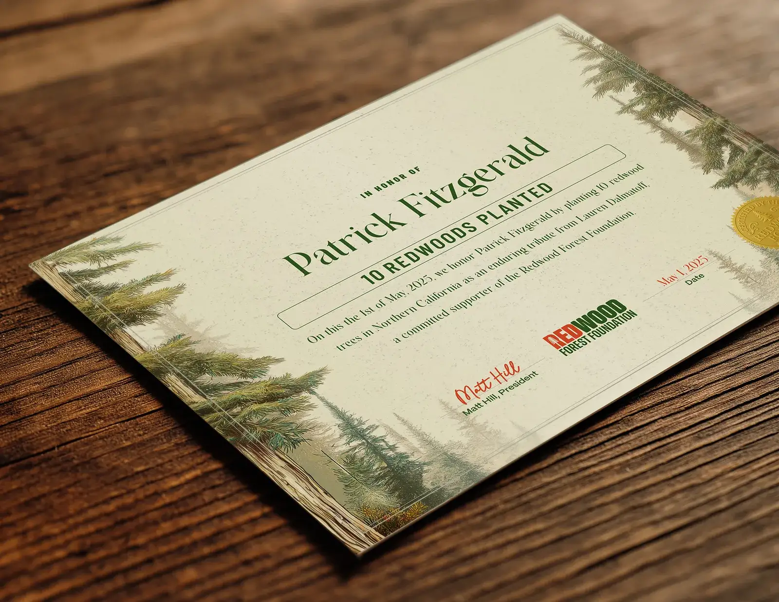 A certificate for ten redwoods planted, on a wooden table