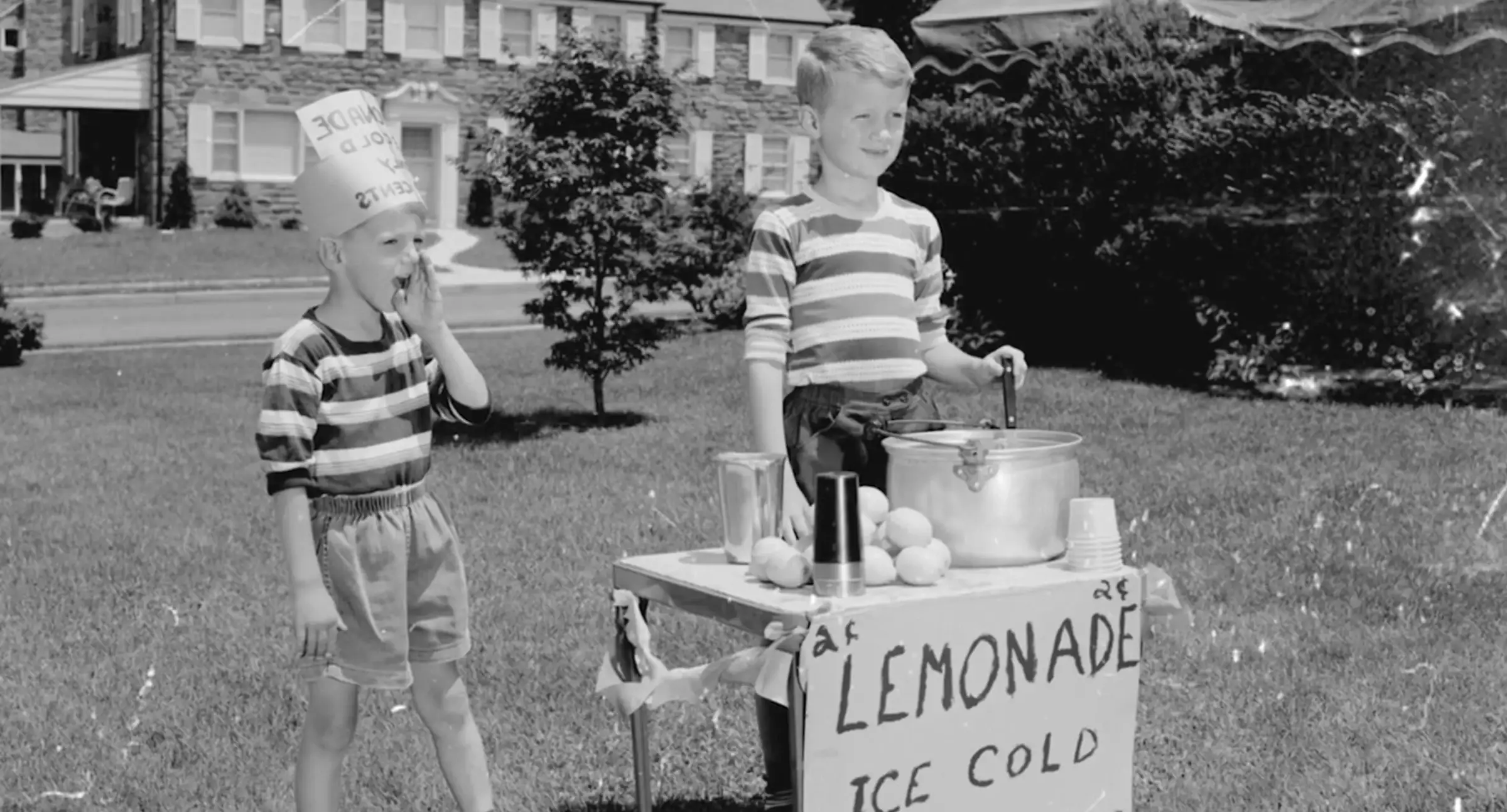 Archival photo of a childhood lemonade stand (case film still)